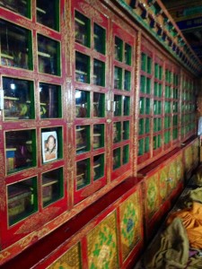 Glass faced book cases holding the wooden and fabric prayer books at Likkir monastery, Ladakh. 